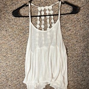 Aeropostale white tank top with cute flower detail in the back, size small